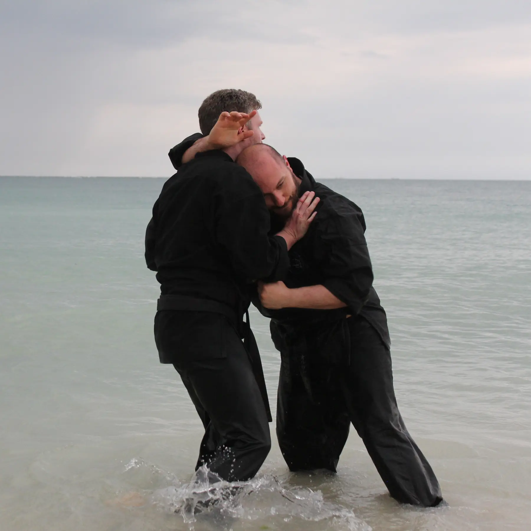 Olgun practicing kumite with John Wetherell Sensei [4th Dan Karate & Black Sash Wing Chun Kung Fu]